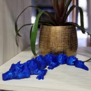 flexibledragon_dragonprinted_3dprinteddragon_sleepingdragon3d_fabricoaditivo_impressao3d_brinquedo3d_brinquedoimpressao3d_3darticulado